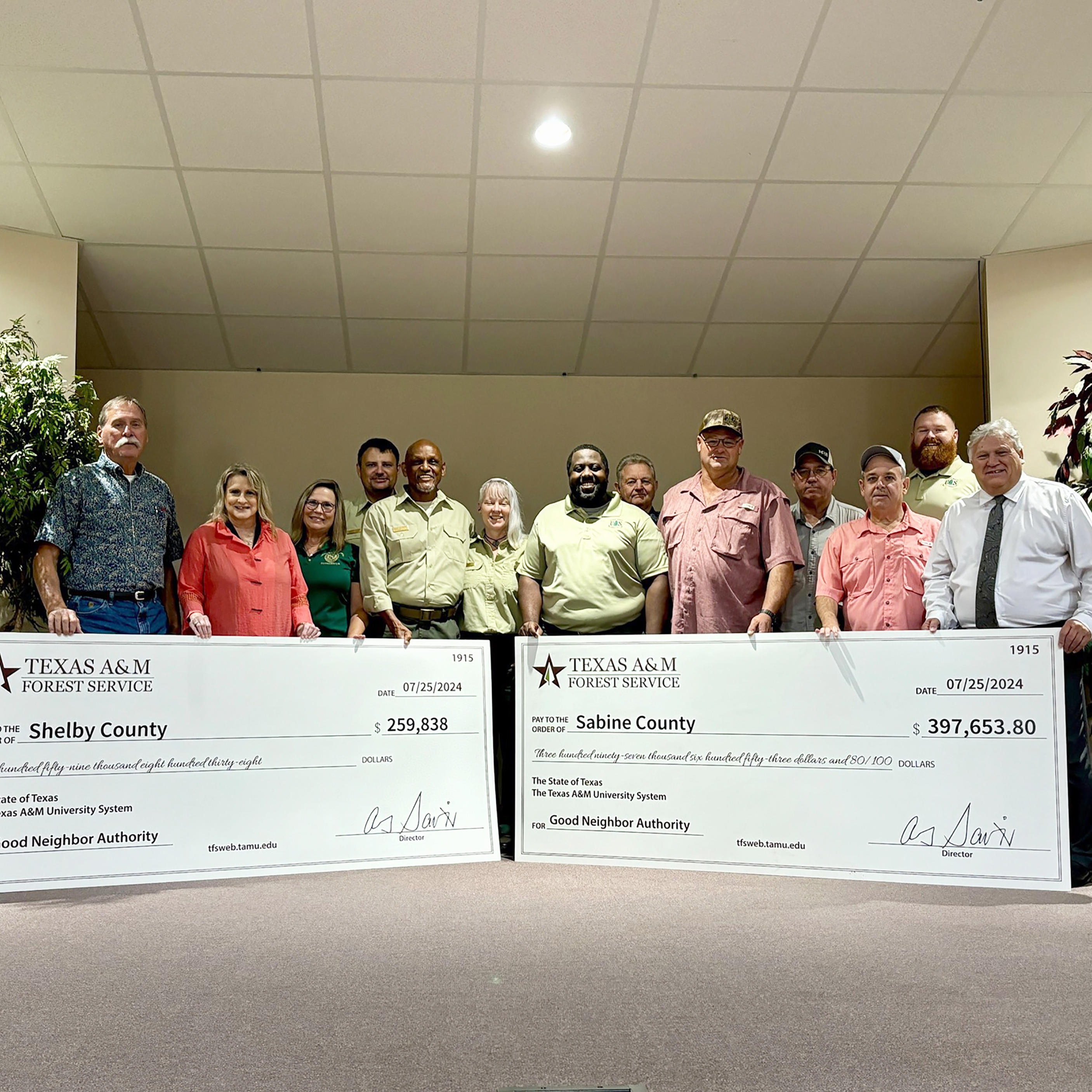 Sabine and Shelby counties received $657,492 for county road improvement projects from timber sale profits through the Good Neighbor Authority partnership between USDA Forest Service and Texas A&M Forest Service.